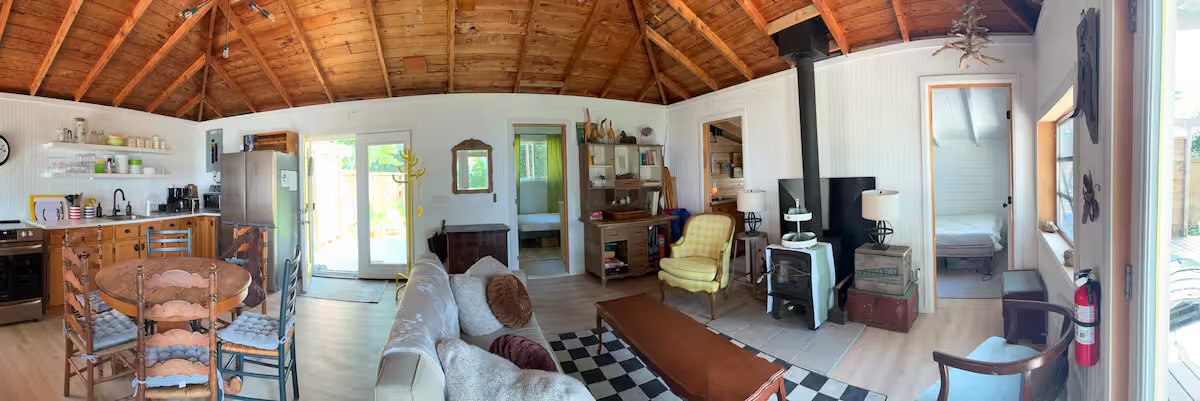 Panoramic view of the open-concept cottage interior